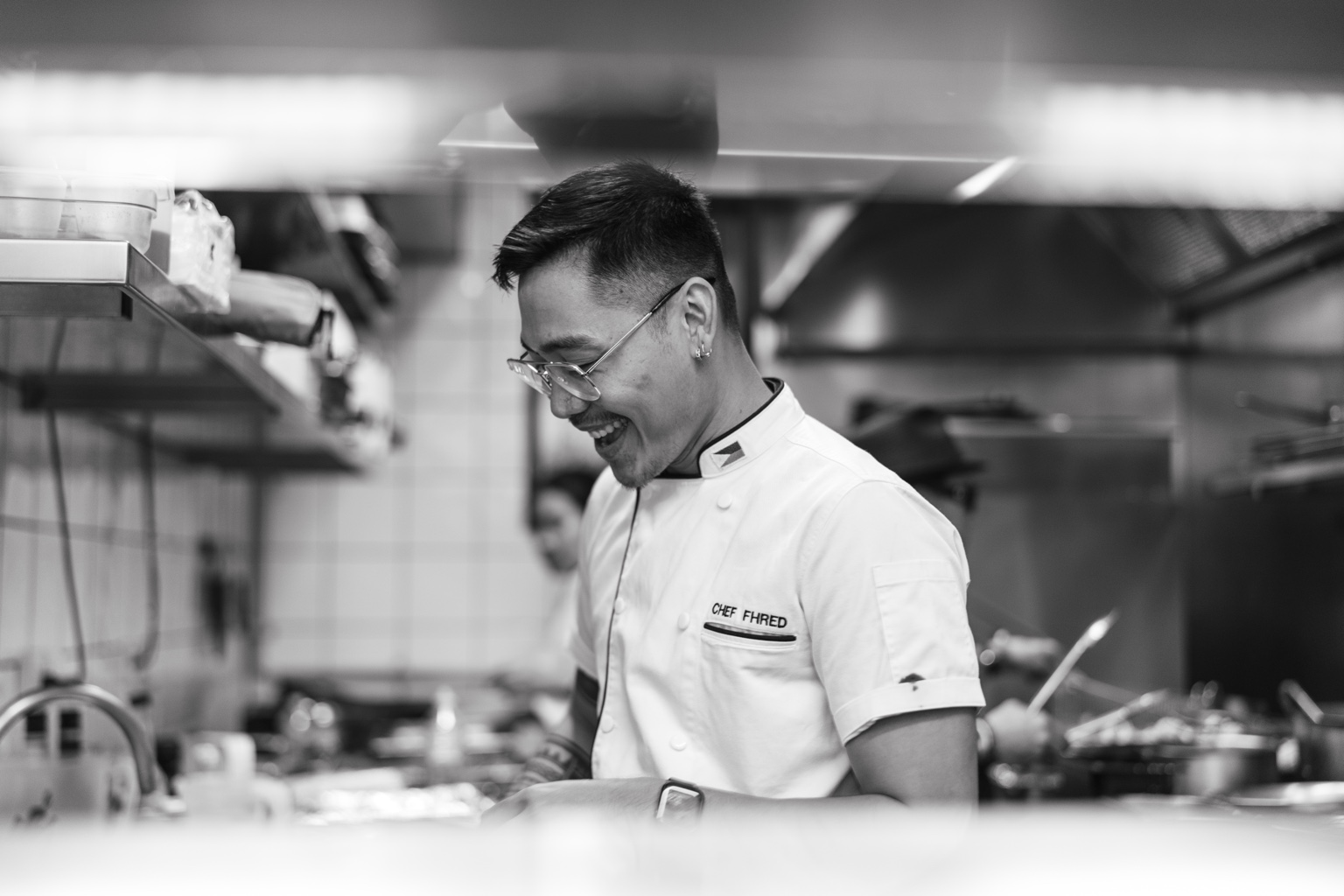 Chef Fhred working in a professional kitchen